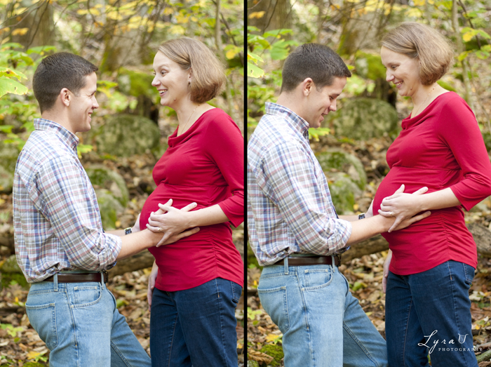 Laughing and laying hands on pregnant belly